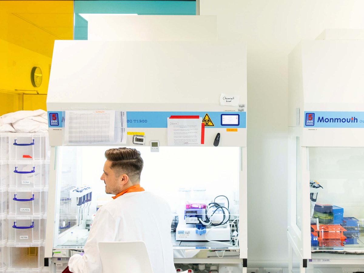 A scientist in a cell culture lab ready to culture iPSC-derived cells like GABAergic Neurons for neurodegenerative disease research